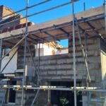 External view showing blockwork construction of the new side extension and first floor bedroom
