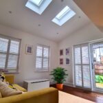 Bright interior of completed open-plan kitchen dining and living single storey extension in St Albans with vaulted ceiling and rooflights