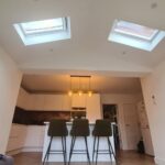 Internal view showing vaulted ceiling with rooflights above the kitchen and family space